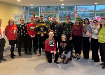 R G Carter Cambridge Team with their Christmas Jumpers